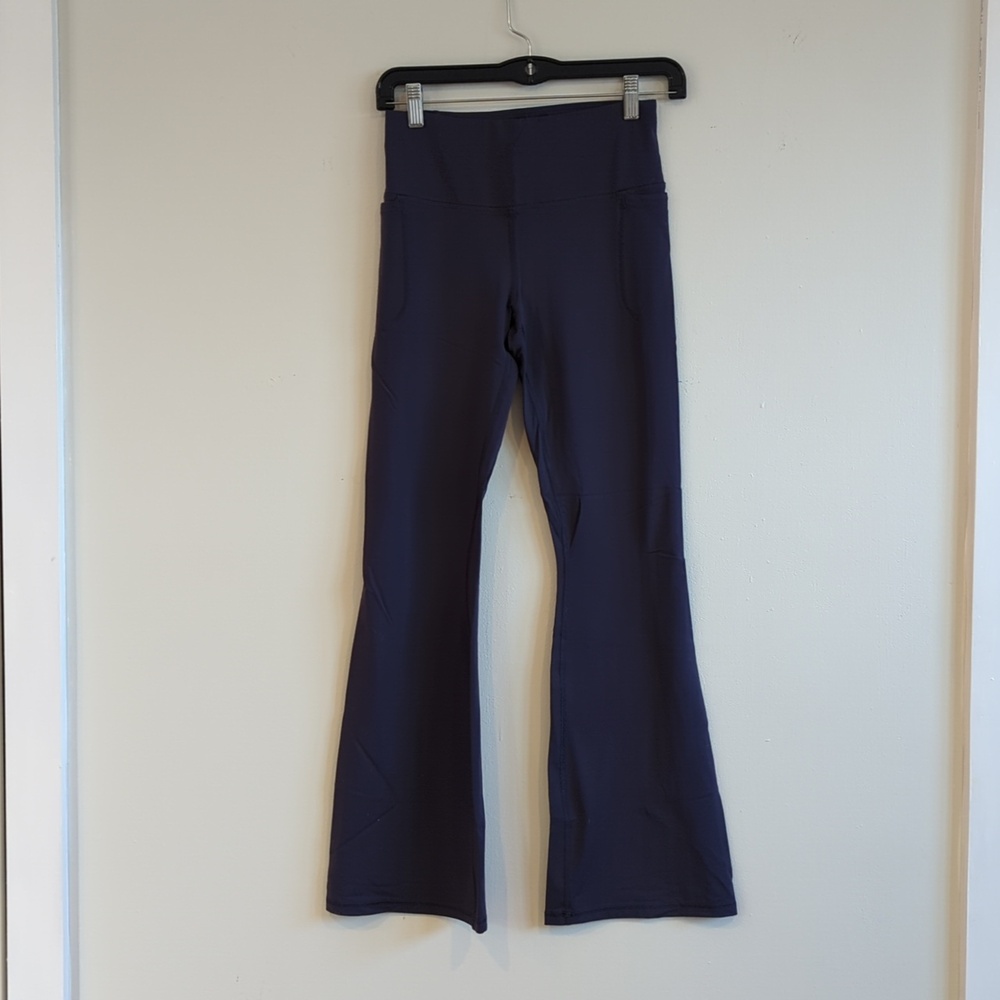Under Armour purple flared leggings